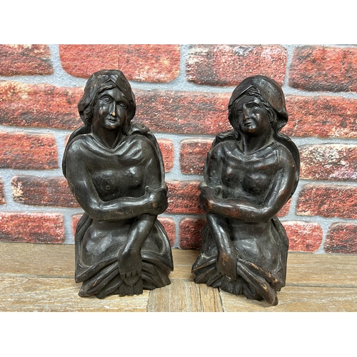 51 - Pair of antique Black Forest styled carvings of two maiden figures, H 38cm (2)