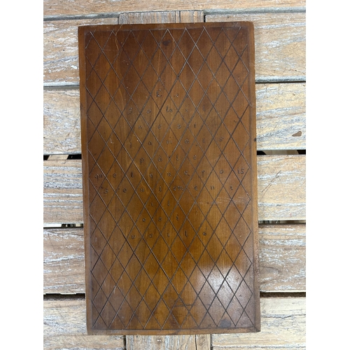 60 - Early 19th century French fruitwood panel, incised with diaper pattern and inscirbed 'le soleil nest... 