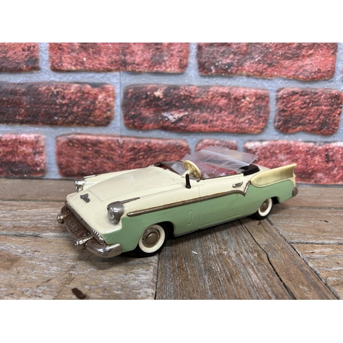 65 - Schuco Elektro-Radio tinplate model car with mint green/cream body, red interior and chrome trim, mo... 