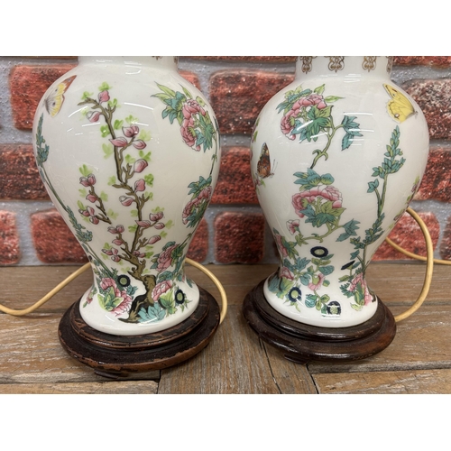 183 - Pair of vintage Chinese table lamps on wooden stands, H 38cm (2)