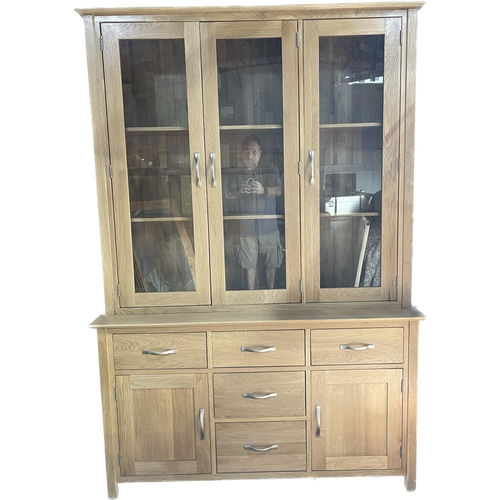 1044 - Cotswold collection oak display cabinet the raised back with three glazed doors on a base fitted wit... 