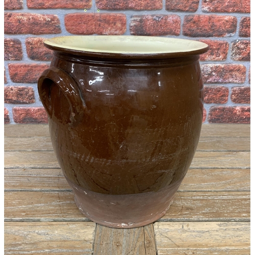 663 - Large glazed terracotta twin handled crock, H 37cm x D 31cm