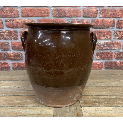 663 - Large glazed terracotta twin handled crock, H 37cm x D 31cm