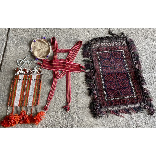 726 - Assortment of flat weave Kelim Bedouin textiles to include camel bags and strapping (4)