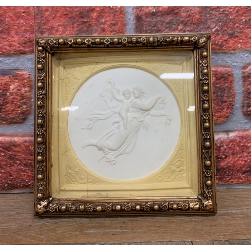 695 - Grand Tour Style carved plaque with maiden and cherub design, 20cm X 20cm