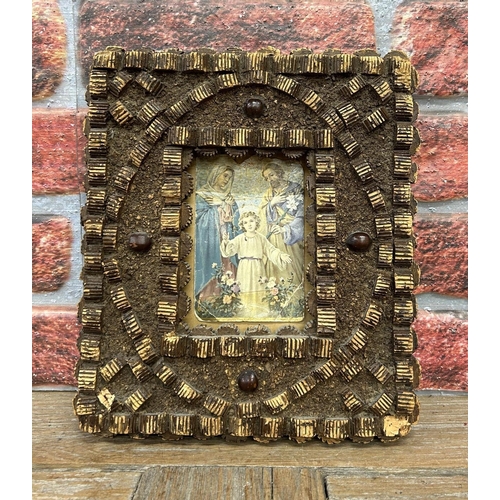 53 - Folk Art cork picture frame with religious print, 29cm x 25cm