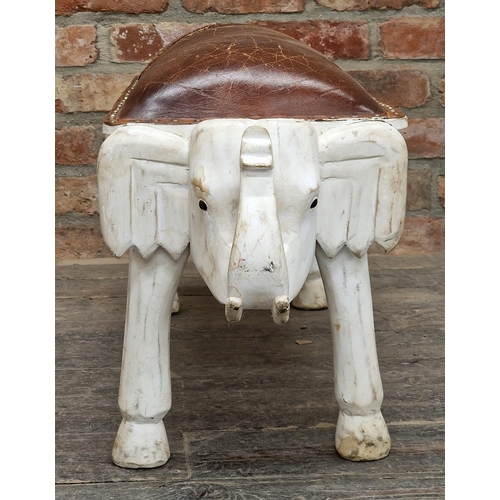 1015 - Contemporary carved elephant stool with studded leather top, H 41cm x W 115cm x D 31cm