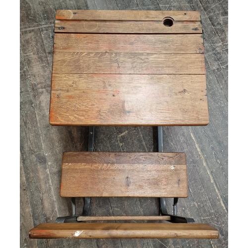 1060 - Vintage school desk with hinged top and folding seat, H 70cm x W 83cm x D 57cm