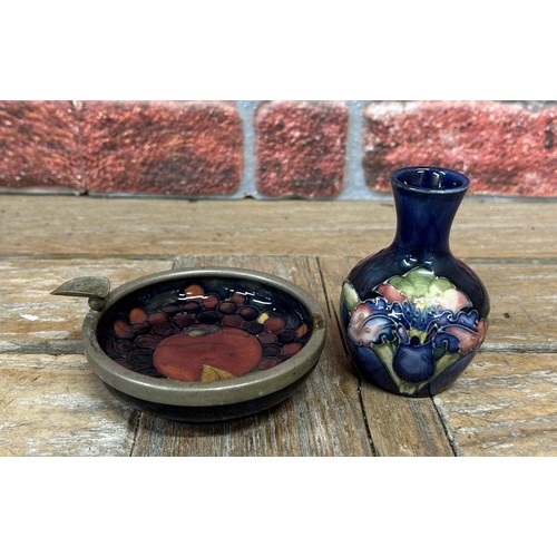 144 - William Moorcroft Orchard pattern ashtray with further miniature vase, largest 10cm (2)