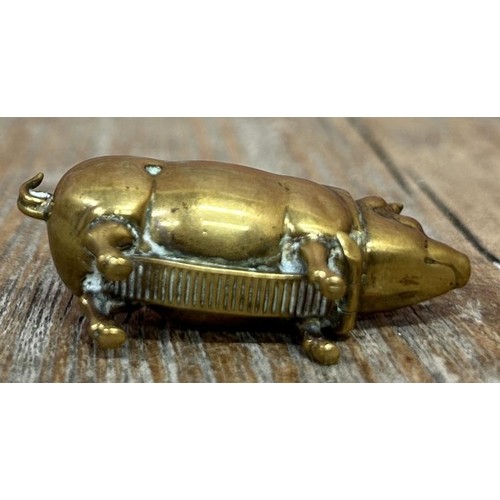 147 - Miniature brass pig vesta case and match strike, L 5cm (displayed in cabinet)