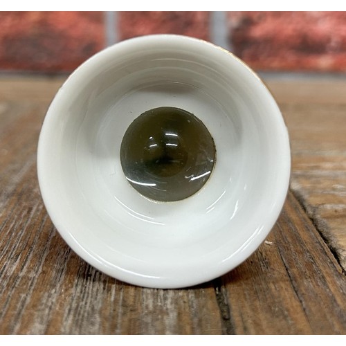 148 - Novelty hand painted Japanese pornographic eye glass sake cup (displayed in cabinet)