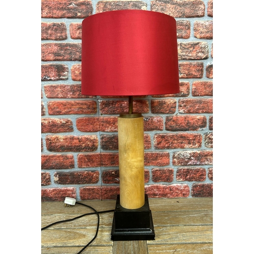 682 - Contemporary wooden column desk lamp with red canvas shade, H 77cm