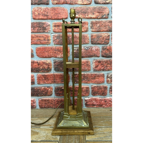 690 - Impressive oak and brass pierced stem table lamp, H 60cm