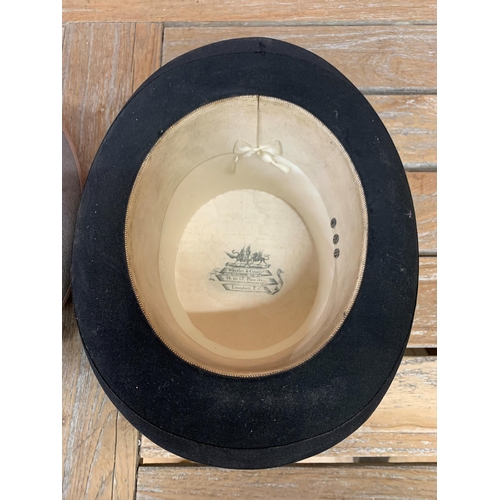 745 - Two antique black silt top hats to include Lincoln & Bennet and Wheeler and Company example with a f... 