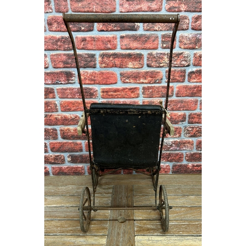 684 - Victorian cast iron and leather baby pram