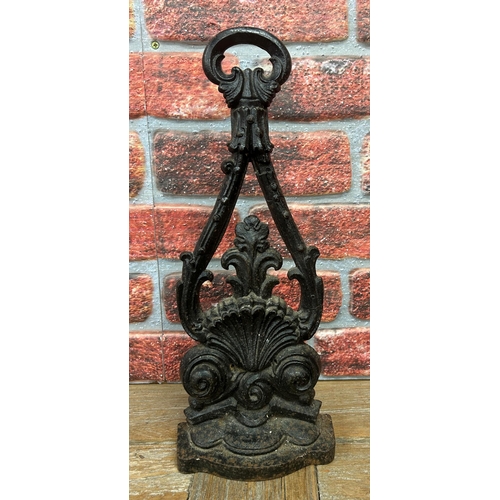 492 - Victorian cast iron scallop shell door stop, H 44cm