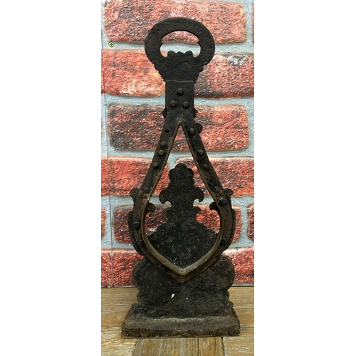 492 - Victorian cast iron scallop shell door stop, H 44cm