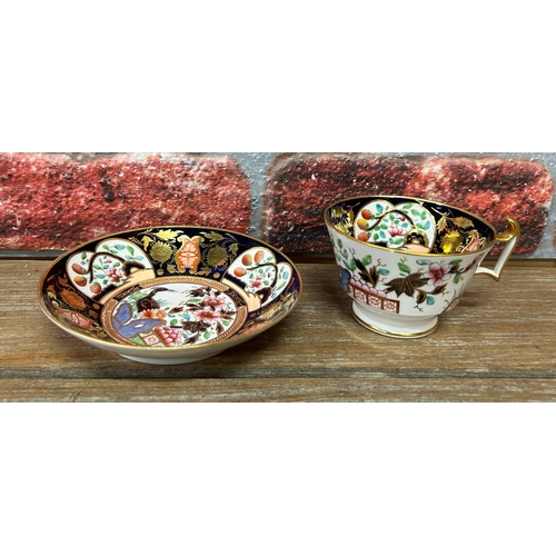 434 - Quantity of Victorian hand painted floral cabinet cups and saucers to include Minton, Royal Crown De... 