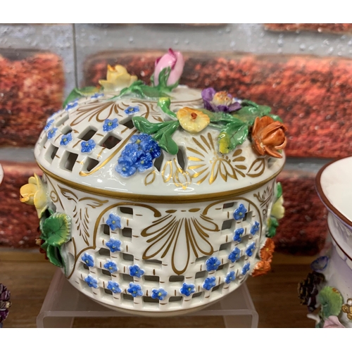 444 - Assortment of antique continental ceramics to include floral encrusted vases and Dresden pierced lid... 