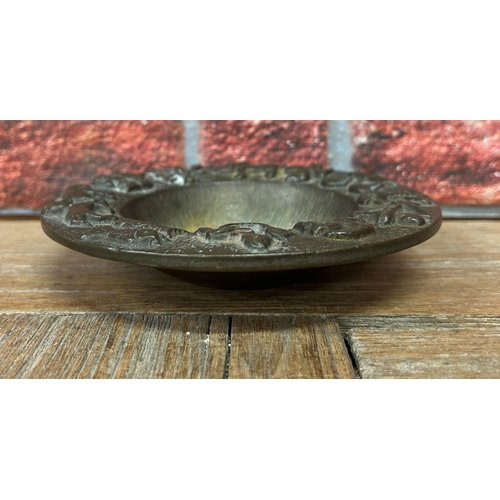 500 - Antique heavy bronze zodiac sign bowl, D 15cm