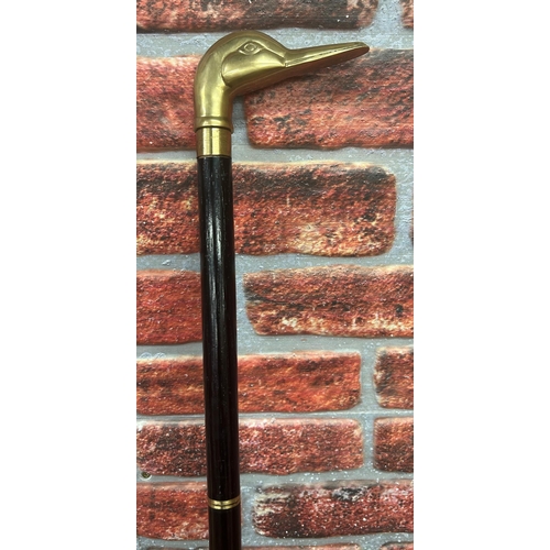 566 - Antique brass duck head topped three piece prohibition walking stick, with internal glass flask, L 9... 