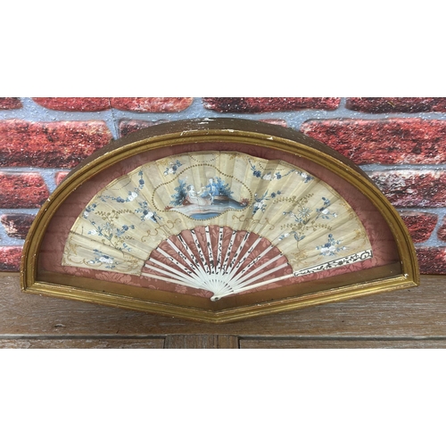 567 - Framed hand painted Victorian silk fan with floral and central romantic scene