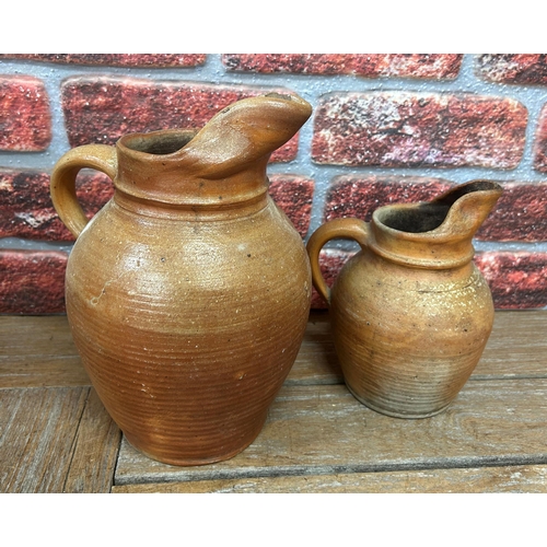 455 - Collection of antique brown salt glazed stoneware jugs, largest H 42cm (6)