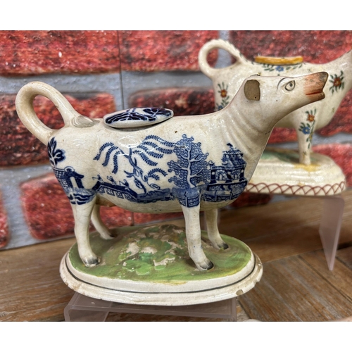 457 - Quantity of antique Staffordshire cow creamers to include floral and Old Willow examples with an add... 