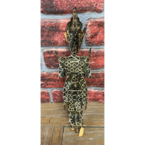 379 - Unusual Indonesian prosperity coin doll, H 40cm