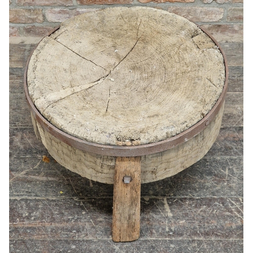 1190 - Antique rustic circular butchers block with applied metal banding, H 42cm x W 63cm