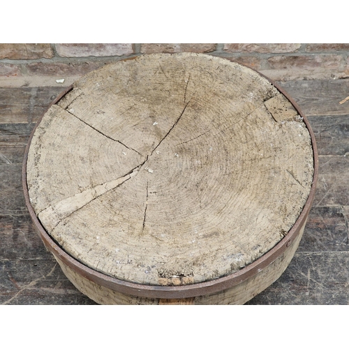 1190 - Antique rustic circular butchers block with applied metal banding, H 42cm x W 63cm