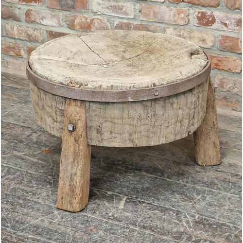 1190 - Antique rustic circular butchers block with applied metal banding, H 42cm x W 63cm