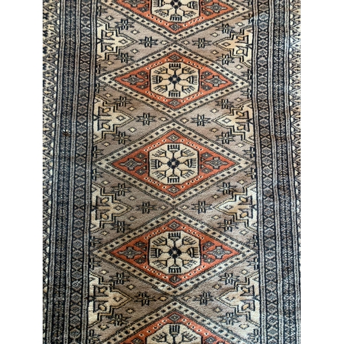 1601 - Good silk blend Persian Village tribe rug, with medallion decoration and signature, 175 x 96cm