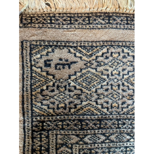 1601 - Good silk blend Persian Village tribe rug, with medallion decoration and signature, 175 x 96cm