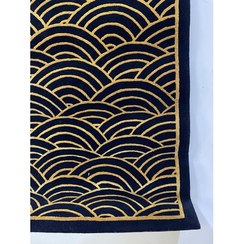 1614 - Good quality Pierre Frey custom made carpet with repeating gold deco wave decoration on black ground... 