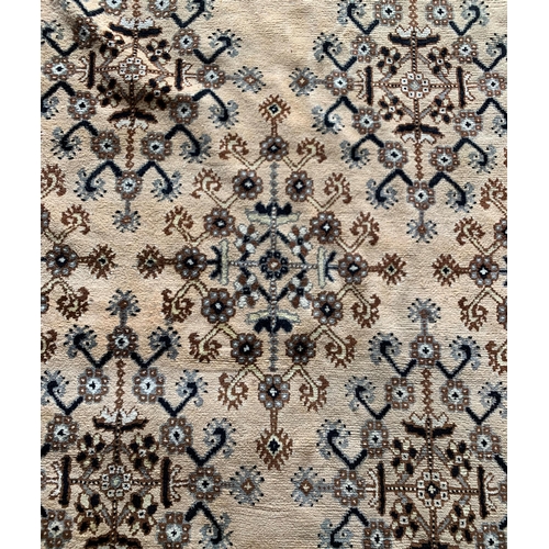 1591 - Large Bedouin style rug, bespoke geometric design on fawn ground, 294cm x 197cm