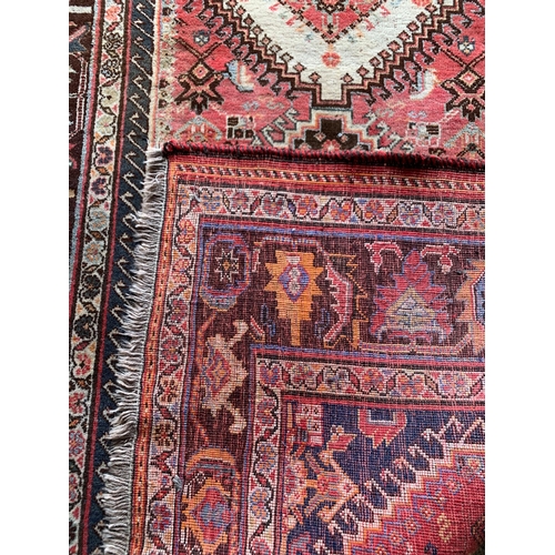 1625 - Good Persian Village rug, diaper panel decoration, 285cm x 155cm