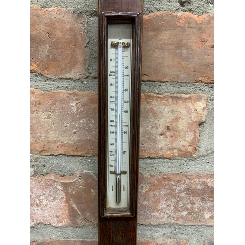 302 - Antique ships maritime stick barometer by G.E Picks Plymouth, having white enamelled face and brass ... 