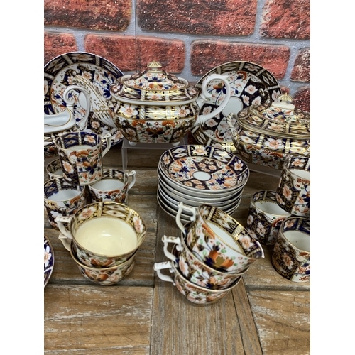 432 - Antique 19th century hand painted Royal Derby Imari tea service to include tea pot, cups and saucers