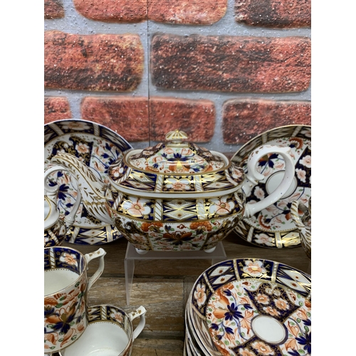 432 - Antique 19th century hand painted Royal Derby Imari tea service to include tea pot, cups and saucers