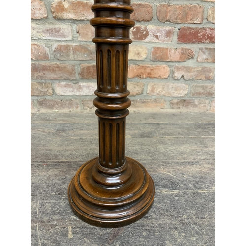 510 - Cast bronze sculpture of bird atop fluted mahogany torche column, 105cm