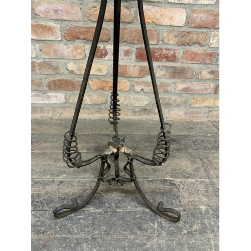 504 - Art Nouveau floral copper jardinière held atop decorative wrought iron stand, H 100cm