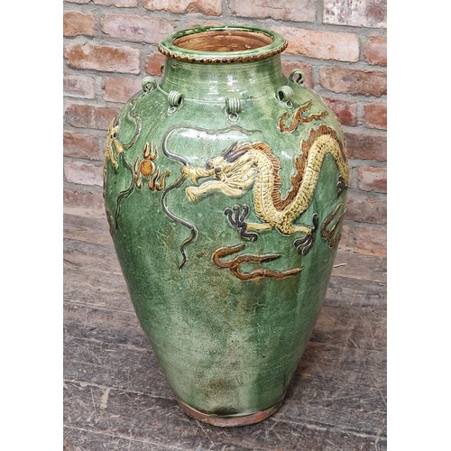 425 - Very large glazed Chinese vase with dragon relief decoration, H 85cm (af)