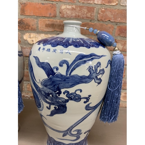 368 - Pair of large Chinese Kangxi style hand painted blue and white ginger jars decorated with dragon and... 