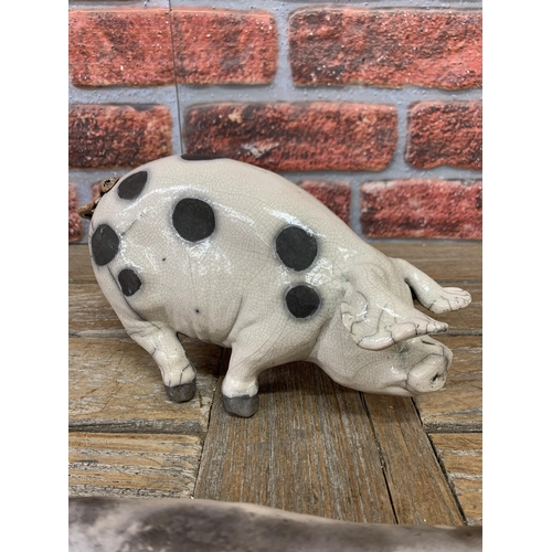 466 - Raku pottery spotted pig with further 'Dring Sow' example, both signed to base, largest L 25cm