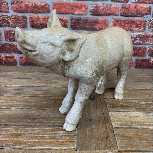 467 - Ex Butchers shop display Raku pottery pig, H 39cm x L 53cm