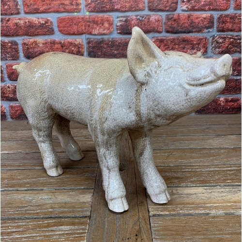 467 - Ex Butchers shop display Raku pottery pig, H 39cm x L 53cm