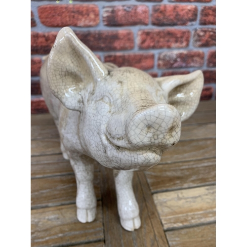 467 - Ex Butchers shop display Raku pottery pig, H 39cm x L 53cm