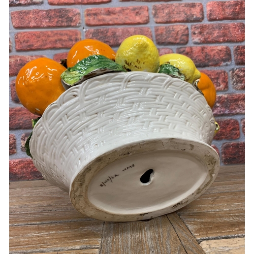 469 - Large Italian majolica lemon and orange fruit basket display, H 35cm