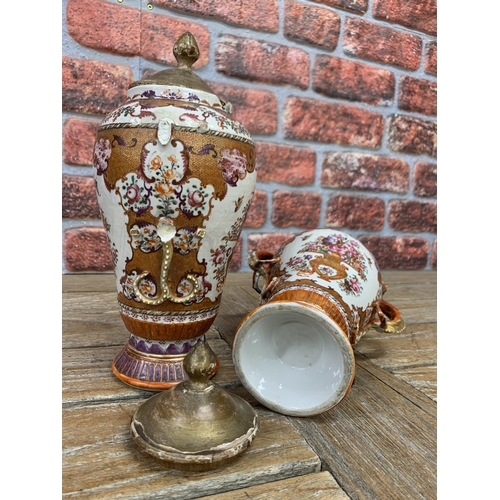 381 - Pair of 19th century Chinese Mandarin twin handled vases with associated lids, H 26cm